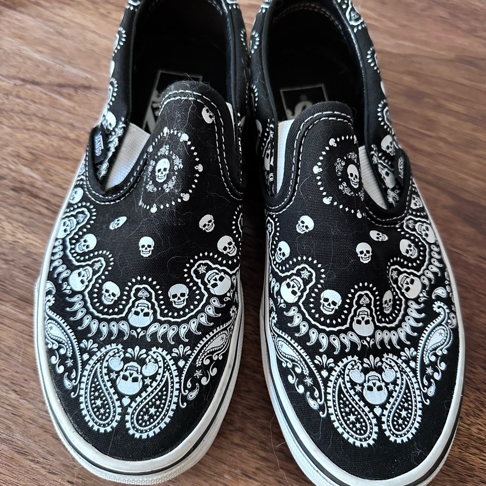 Vans Skulls Black and White Paisley Slip-Ons